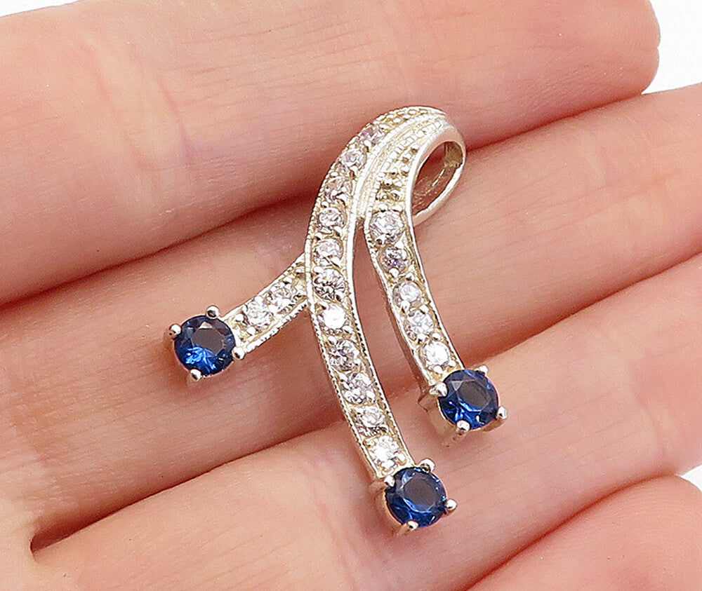 925 Sterling Silver  Cubic Zirconia & Blue Topaz Swirl Ribbon Pendant  PT3374