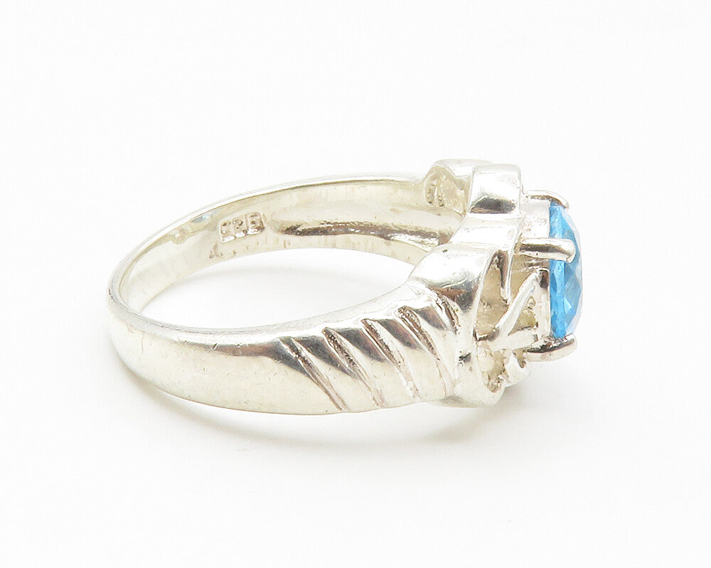 925 Sterling Silver  Blue Topaz Open Floral Shiny Band Ring Sz 7  RG14122