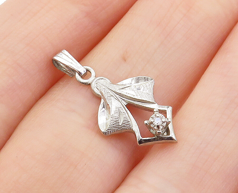 925 Sterling Silver  Genuine Diamond Accented Ribbon Bow Pendant  PT5341