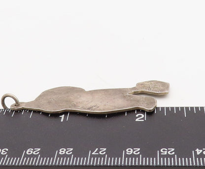 925 Sterling Silver Vintage Pendant LUNT Kid Picking Up Christmas Gift  PT23541
