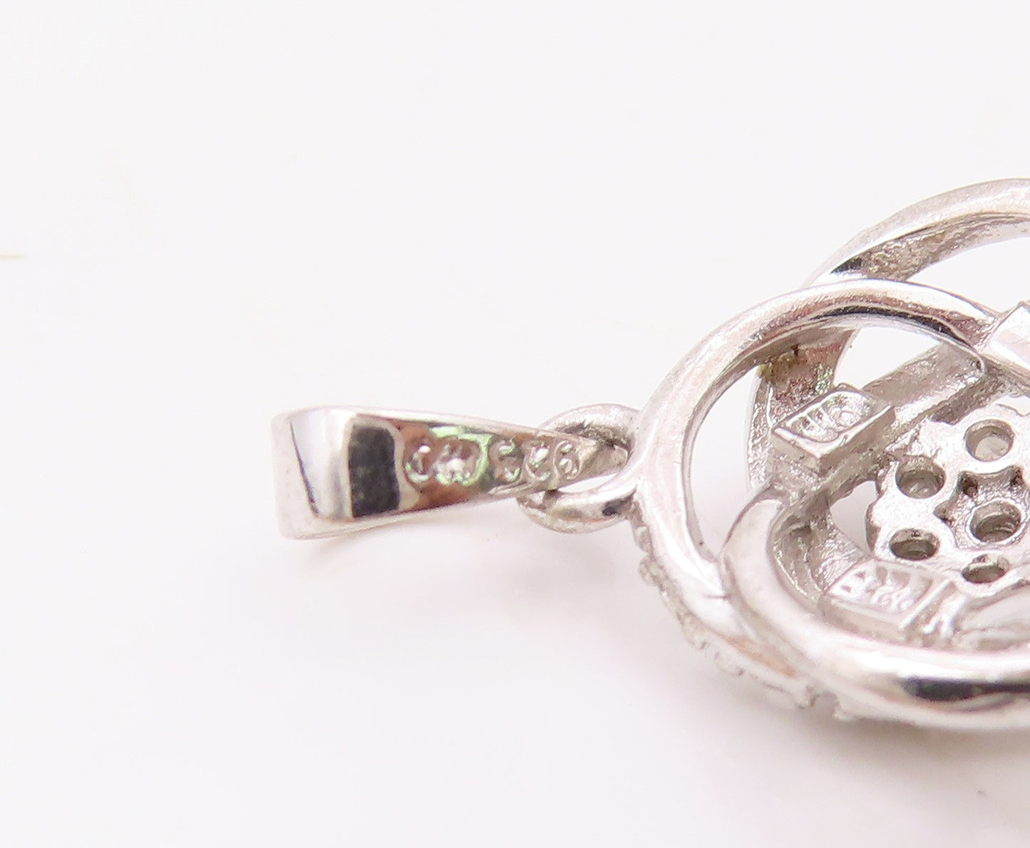 925 Sterling Silver  Genuine Diamonds Floral Knot Design Pendant  PT10373