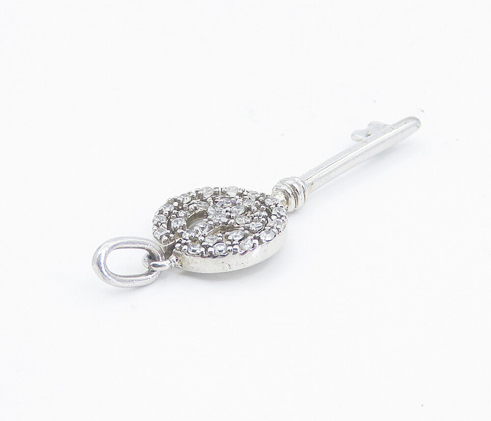 925 Sterling Silver  Shiny Petite Topaz Open Peace Sign Key Pendant  PT6212