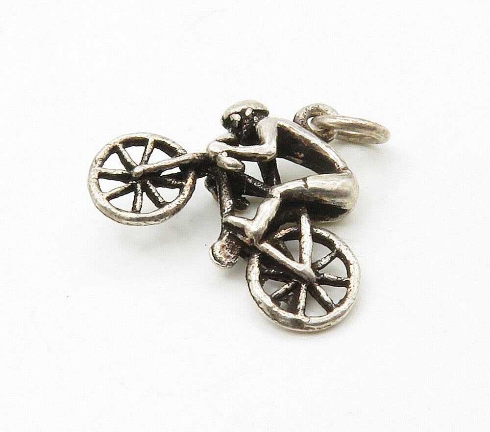 925 Sterling Silver  Vintage Petite Man Riding Bicycle Shiny Pendant  PT13071