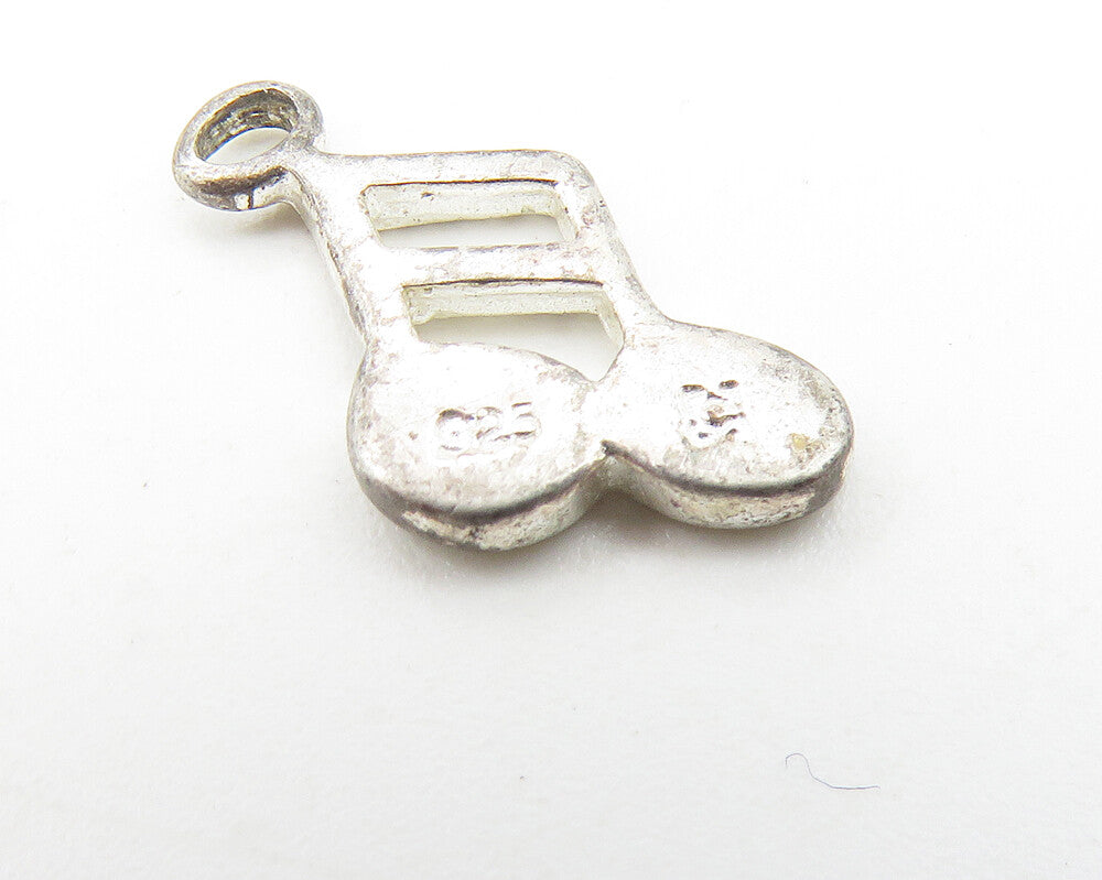 925 Sterling Silver  Vintage Petite Topaz Music Note Motif Pendant  PT8985