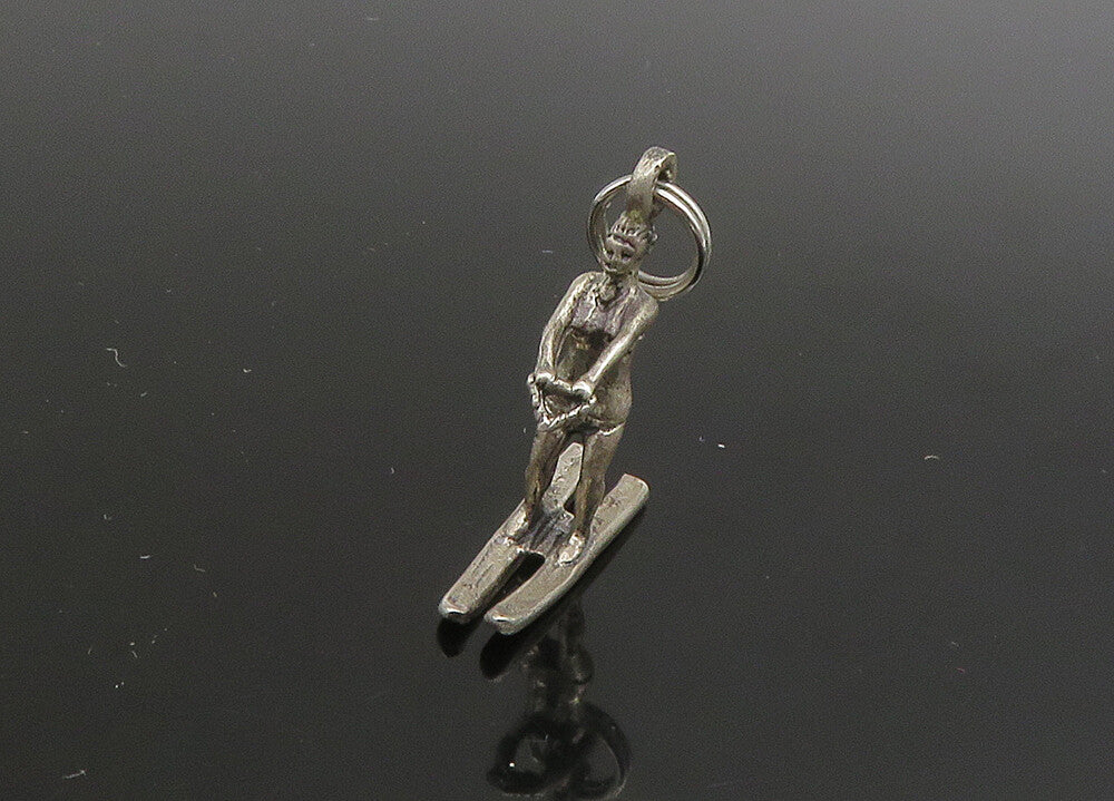 925 Sterling Silver  Vintage Petite Shiny Water Skiing Person Pendant  PT19088
