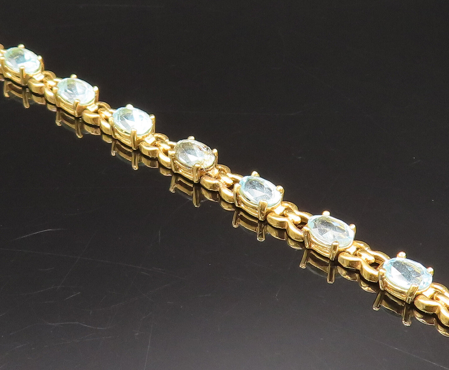 925 Sterling Silver Vintage Gold Plated Oval Blue Topaz Tennis Bracelet BT9769
