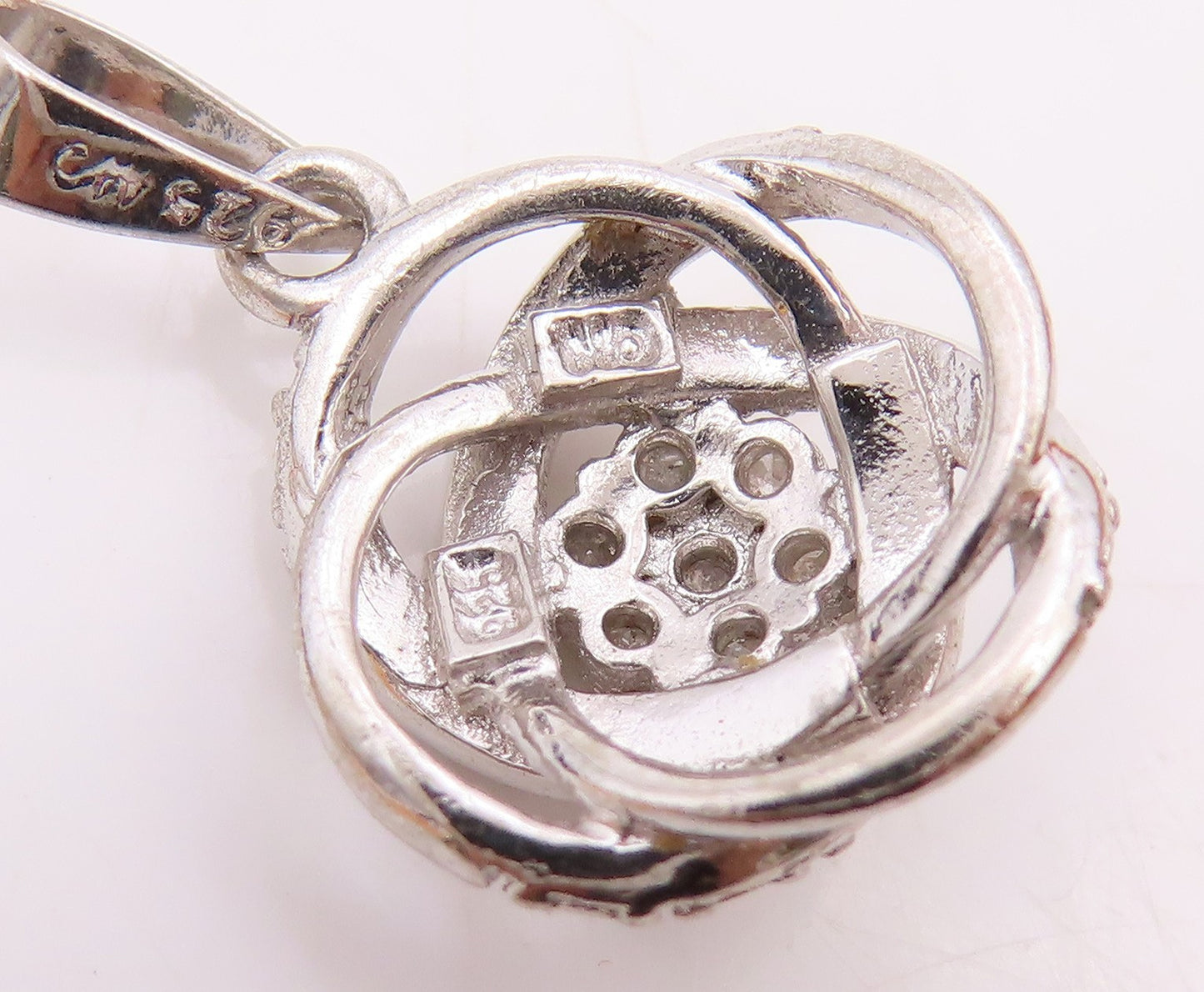 925 Sterling Silver  Genuine Diamonds Floral Knot Design Pendant  PT10373