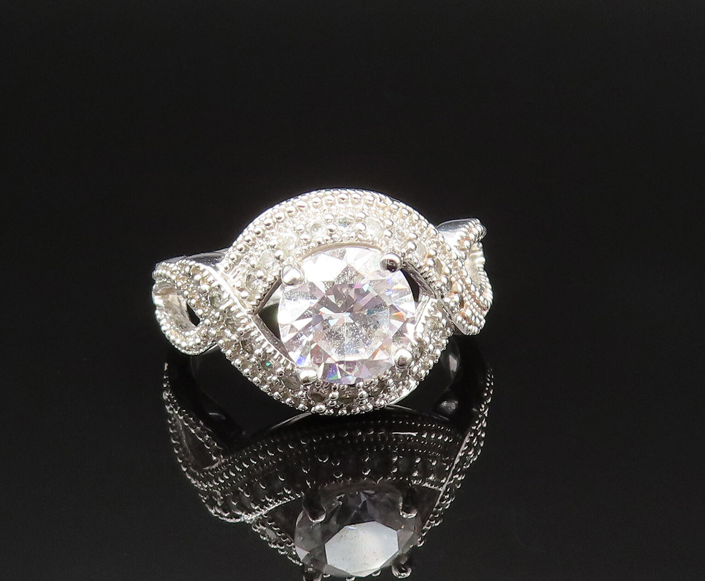 925 Sterling Silver  Vintage Infinity Knot Cubic Zirconia Ring Sz 7.5  RG25503