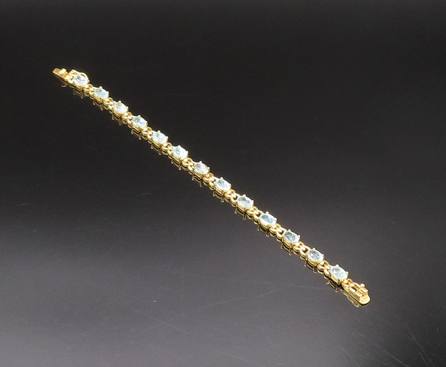925 Sterling Silver Vintage Gold Plated Oval Blue Topaz Tennis Bracelet BT9769