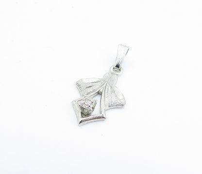 925 Sterling Silver  Genuine Diamond Accented Ribbon Bow Pendant  PT5341