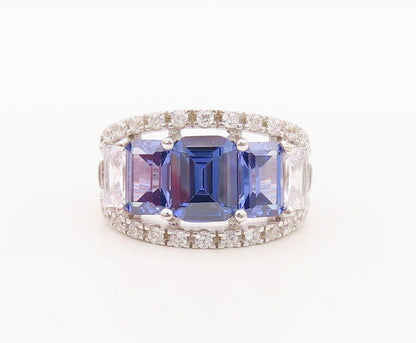 925 Sterling Silver Vintage Ring Designer Cutout Sapphire & Topaz Sz 7.5 RG30058