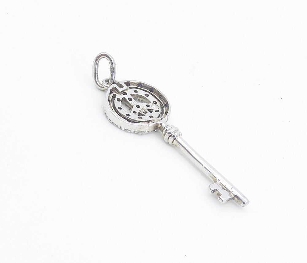 925 Sterling Silver  Shiny Petite Topaz Open Peace Sign Key Pendant  PT6212