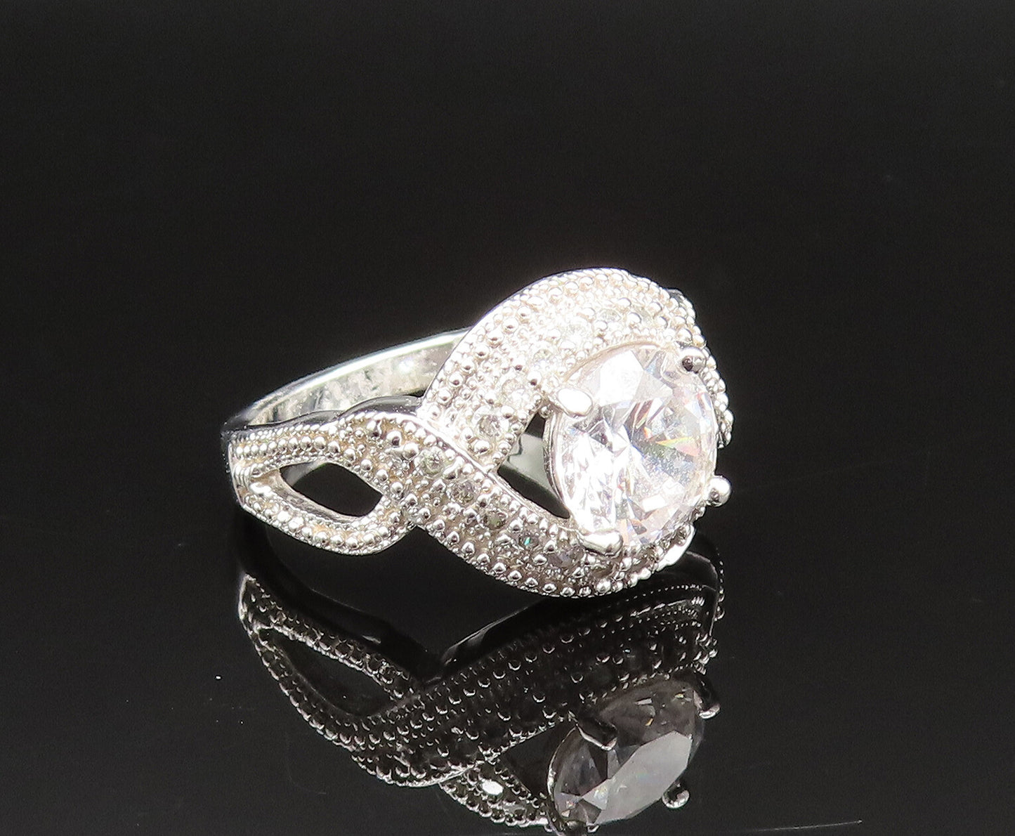 925 Sterling Silver  Vintage Infinity Knot Cubic Zirconia Ring Sz 7.5  RG25503