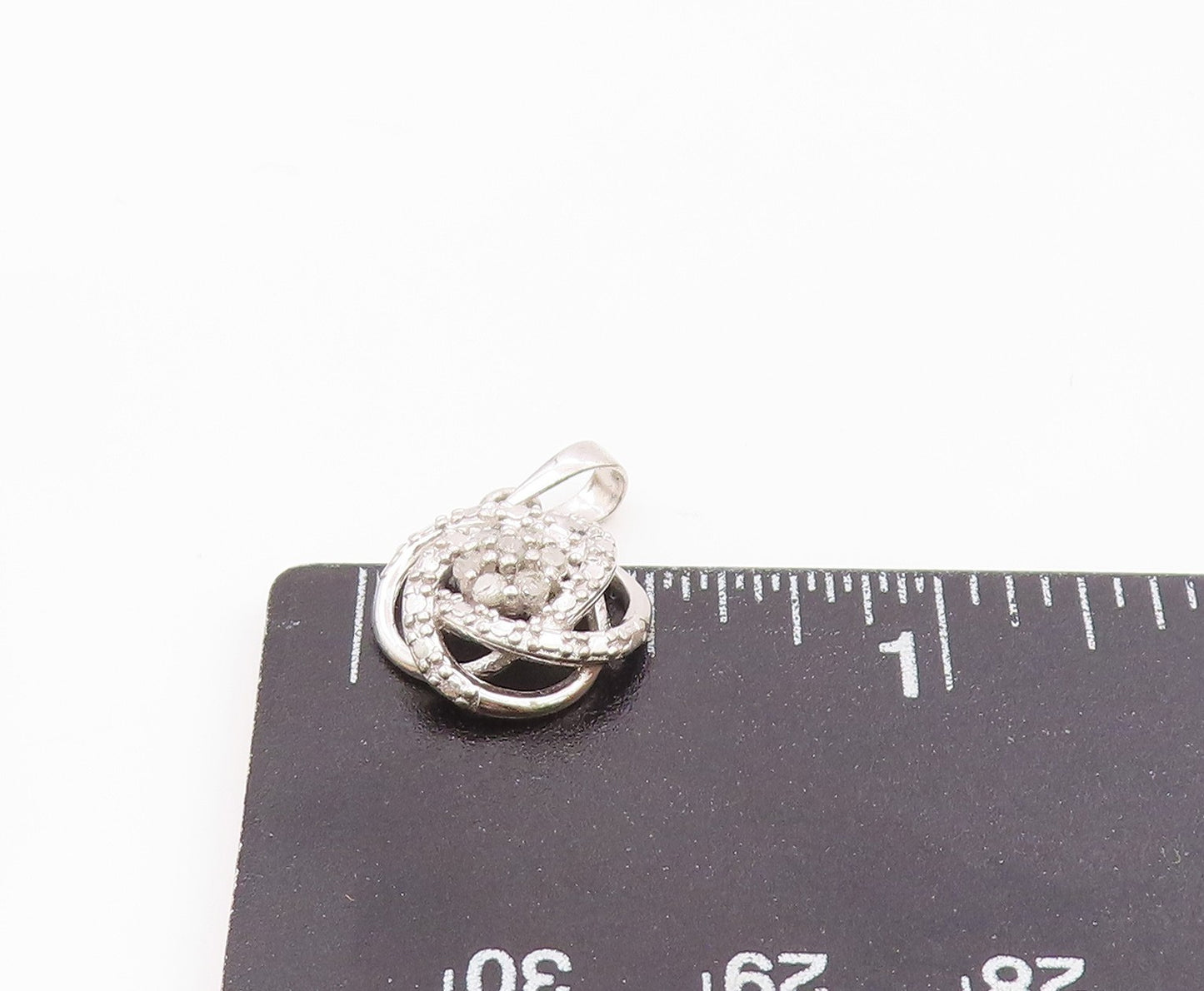 925 Sterling Silver  Genuine Diamonds Floral Knot Design Pendant  PT10373