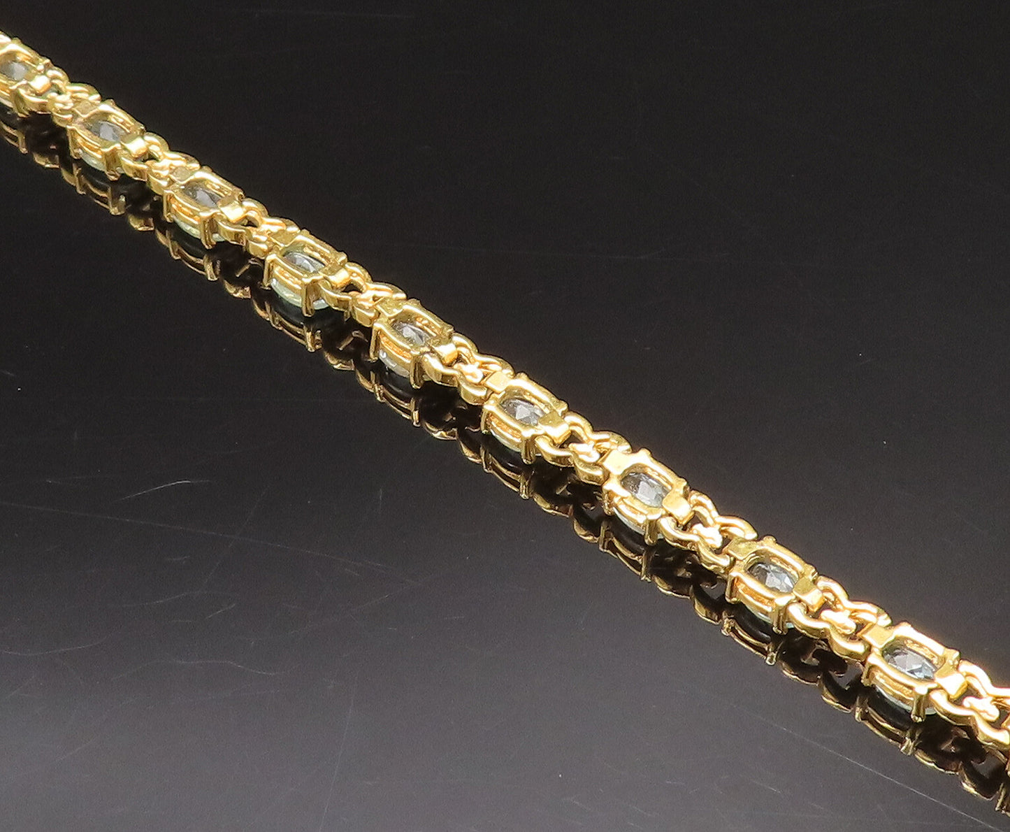925 Sterling Silver Vintage Gold Plated Oval Blue Topaz Tennis Bracelet BT9769