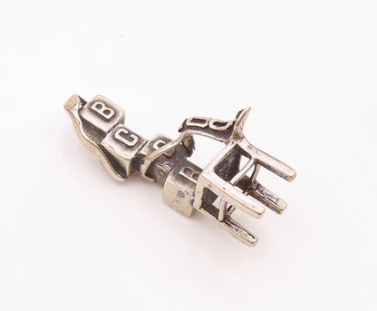 925 Sterling Silver  Dark Tone 2004 Ribbon Blocks & Chair Pendant  PT14498