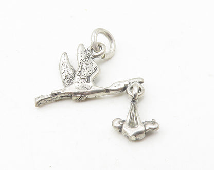 925 Sterling Silver  Vintage Petite Flying Stork With Baby Pendant  PT9372
