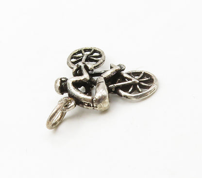 925 Sterling Silver  Vintage Petite Man Riding Bicycle Shiny Pendant  PT13071
